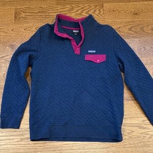 Patagonia Women's quilted blue Sweater with pink - size L. Paint stain
